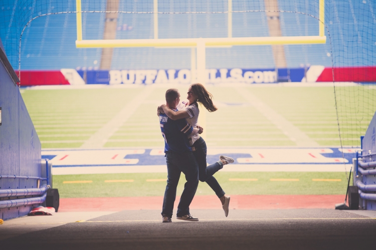 Fun wedding engagement photography taken at Ralph Wilson Bills Stadium.